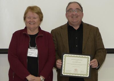 2024 MB Communities in Bloom (MBCIB) Provincial Conference - Portage la Prairie host committee members receive a Certificate of Appreciation from the MB CIB on behalf of the City of Portage la Prairie, Manitoba